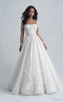 A woman wearing the Belle wedding gown from the 2021 Disney Fairy Tale Weddings Platinum Collection