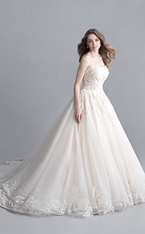 A woman wearing the Aurora wedding gown from the 2020 Disney Fairy Tale Weddings Platinum Collection