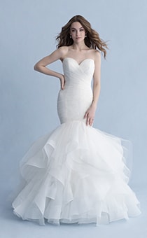 A woman dressed in the Ariel wedding gown from the 2020 Disney Fairy Tale Weddings Collection
