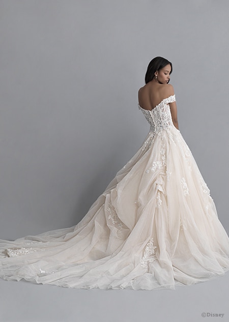 A back side view of a woman wearing the Belle wedding gown from the 2020 Disney Fairy Tale Weddings Platinum Collection