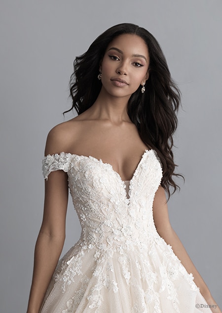 A woman in the Belle wedding gown from the 2020 Disney Fairy Tale Weddings Platinum Collection