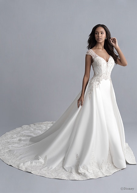 A woman wearing the Jasmine wedding gown from the 2020 Disney Fairy Tale Weddings Platinum Collection