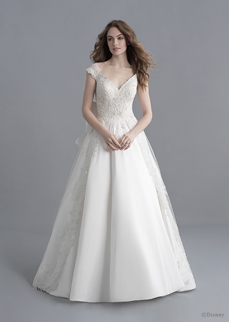 A woman dressed in the Snow White wedding gown from the 2020 Disney Fairy Tale Weddings Platinum Collection