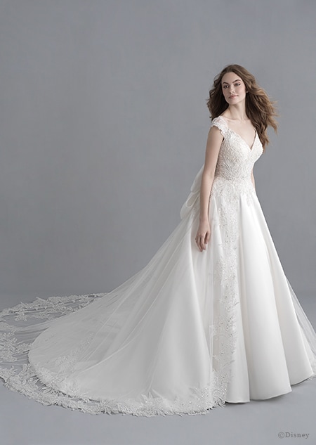 A woman wearing the Snow White wedding gown from the 2020 Disney Fairy Tale Weddings Platinum Collection