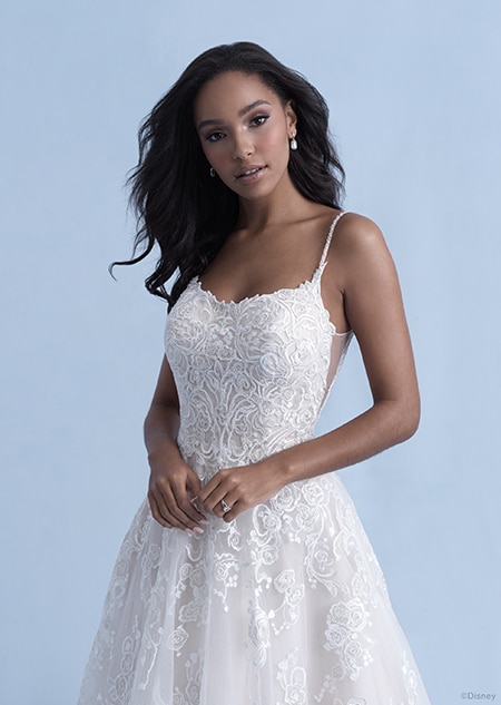 A woman in the Belle wedding gown from the 2021 Disney Fairy Tale Weddings Collection A woman in the Belle wedding gown from the 2021 Disney Fairy Tale Weddings Collection