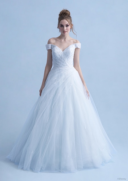 A woman wearing the Cinderella wedding gown from the 2021 Disney Fairy Tale Weddings Collection