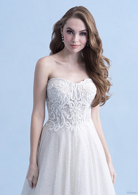 A woman in the Cinderella wedding gown from the 2021 Disney Fairy Tale Weddings Collection