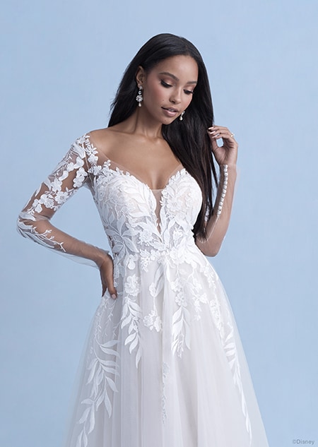 A woman in the Pocahontas wedding gown from the 2021 Disney Fairy Tale Weddings Collection