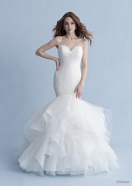 A woman dressed in the Ariel wedding gown from the 2020 Disney Fairy Tale Weddings Collection