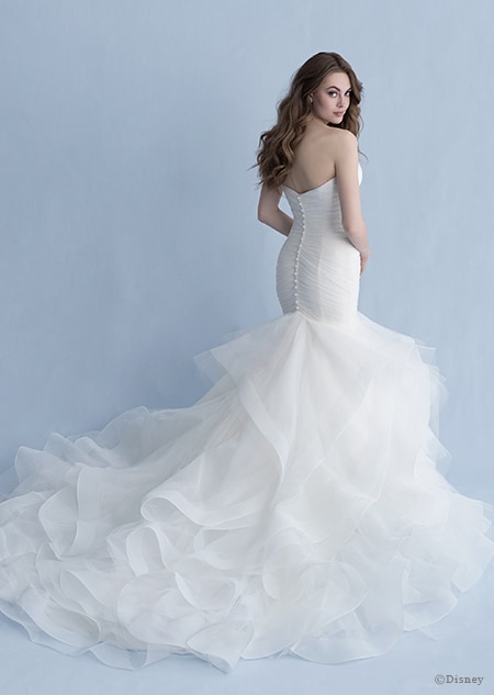 A back side view of a woman in the Ariel wedding gown from the 2020 Disney Fairy Tale Weddings Collection