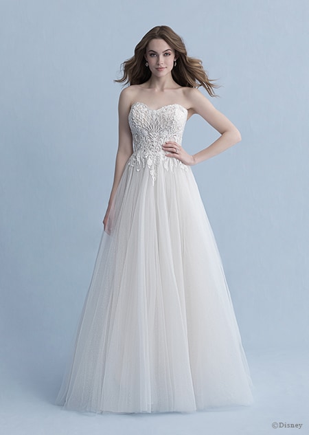 A woman dressed in the Aurora wedding gown from the 2020 Disney Fairy Tale Weddings Collection