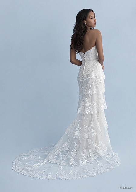 A back side view of a woman in the Tiana wedding gown from the 2020 Disney Fairy Tale Weddings Collection