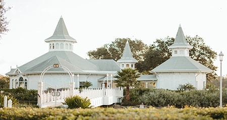 The exterior of the Disney’s Wedding Pavilion, a ceremony venue with Victorian architecture