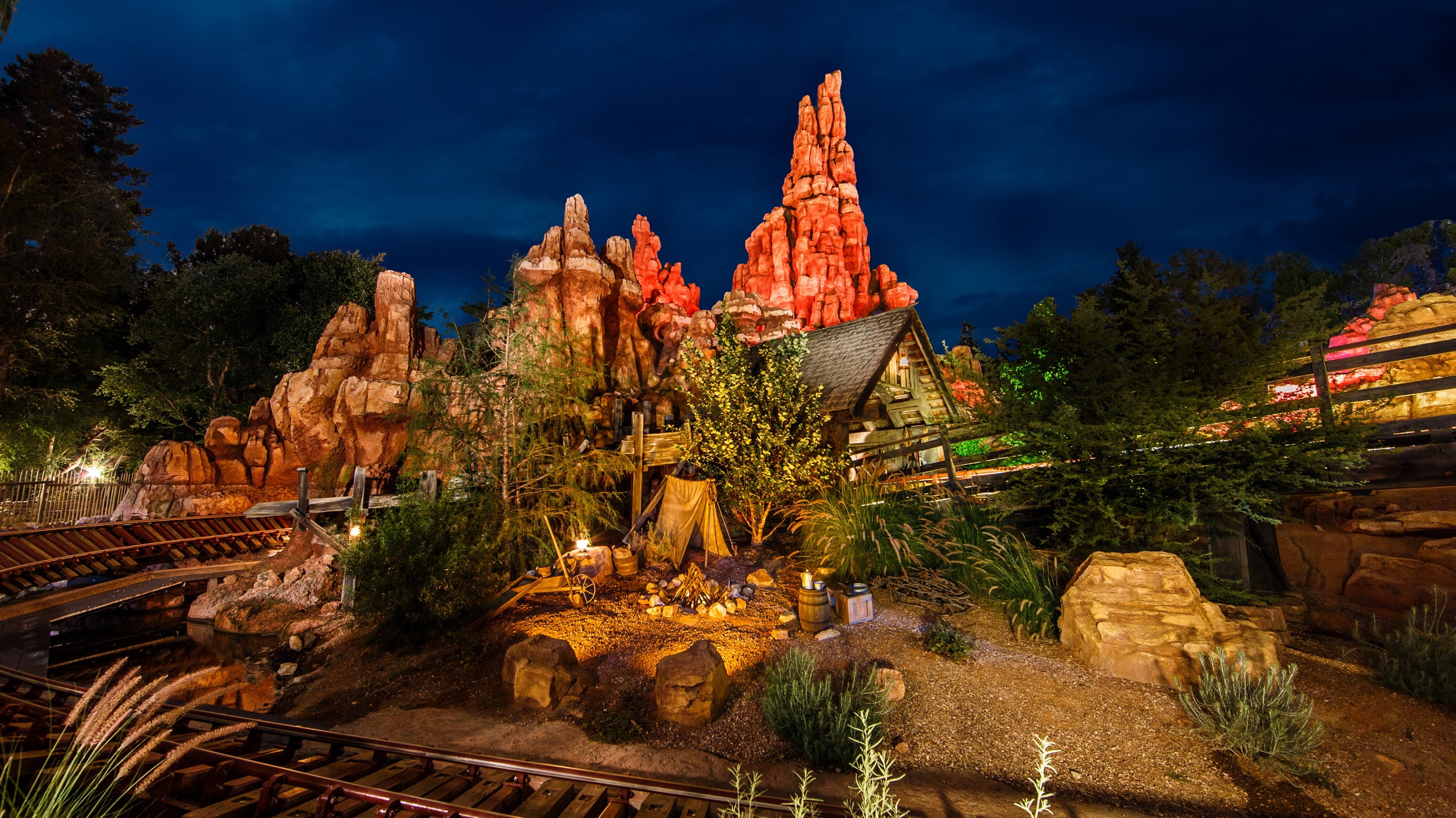 The Big Thunder Mountain Railroad attraction at Disneyland Park at night