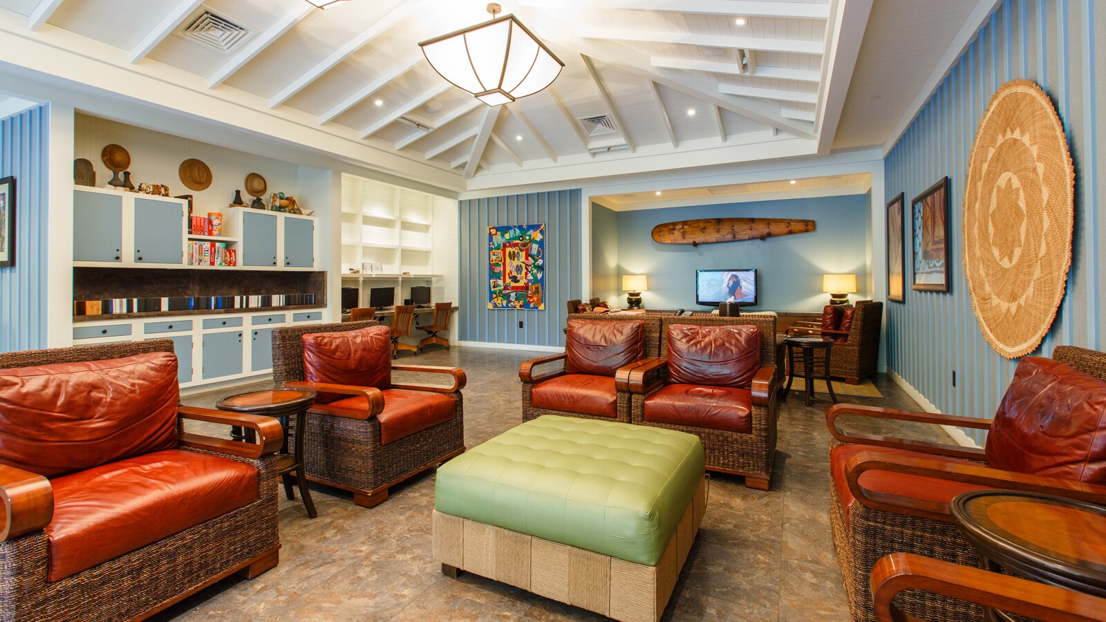 The seating area in the Pau Hana Room at Aulani