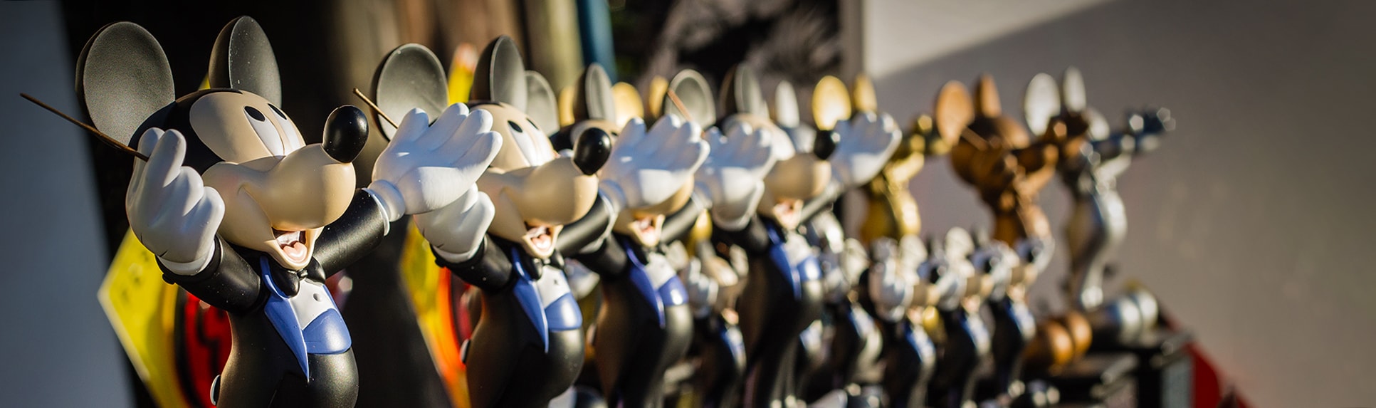 A row of Mickey Mouse statue awards